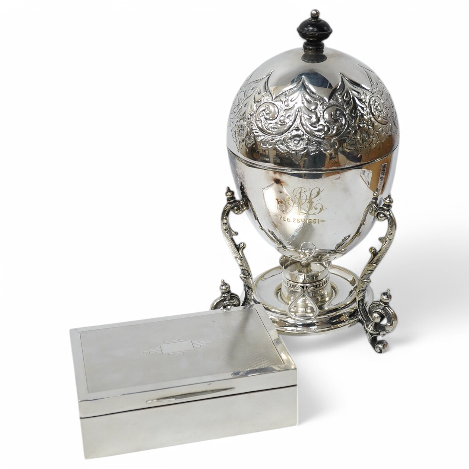 A George V Art Deco silver mounted rectangular cigarette box, by D. Bros, Birmingham, 1931, 12.7cm, together with a silver plated egg coddler with burner. Condition - fair to good